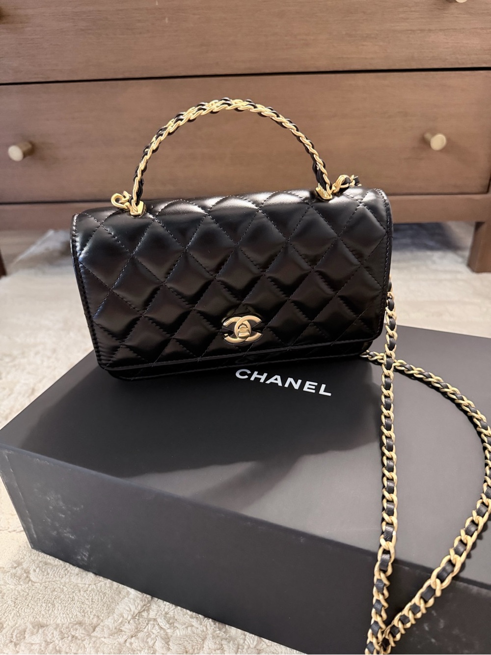 CHANEL Black Quilted Leather Top Handle Mini Flap Bag with Gold Hardware
New!
